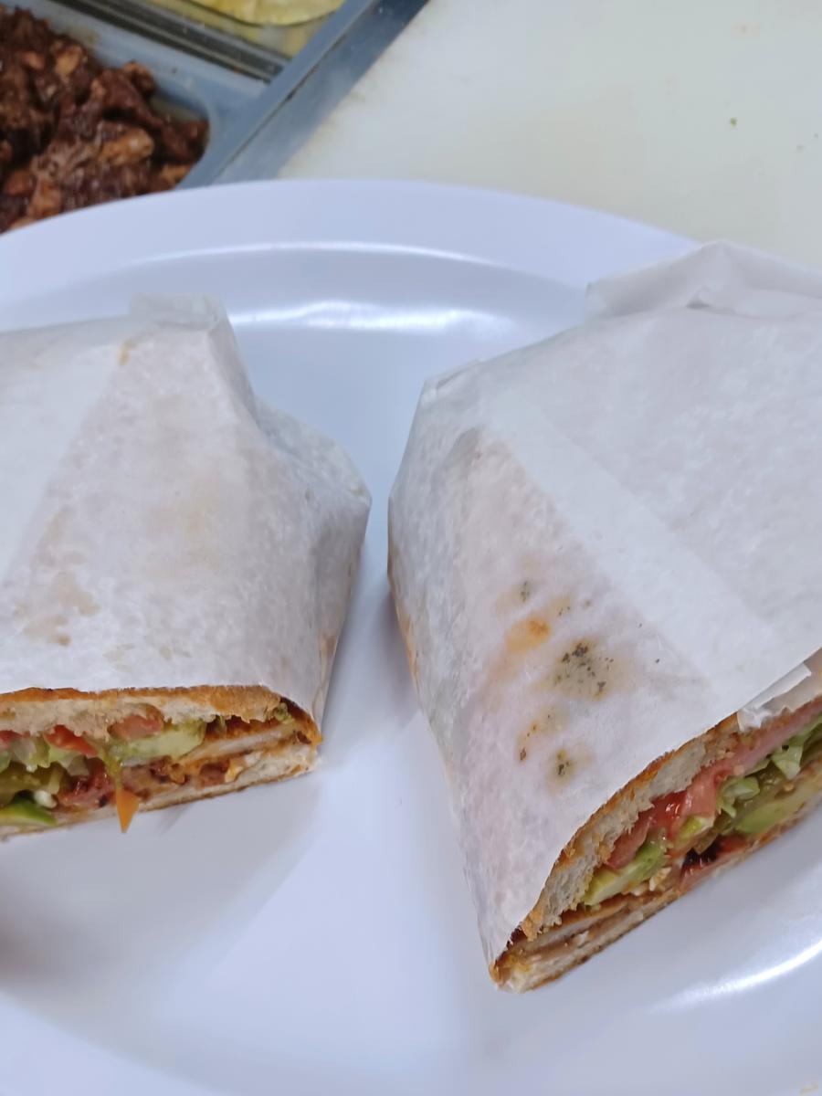 Mexican Chicken Torta - Pressed Mexican-style chicken torta with avocado.